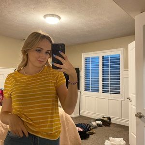 Yellow and white striped graphic T-shirt. Loose fit and works with all outfits